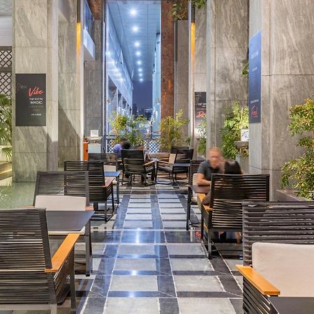 فندق البندر روتانا - دبي كريك المظهر الخارجي الصورة Interior of a restaurant in Tehran